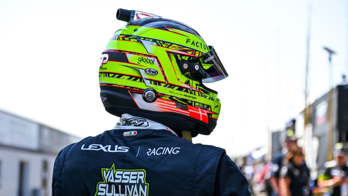 Profile of number 12 Lexus GT3 racecar on the track.