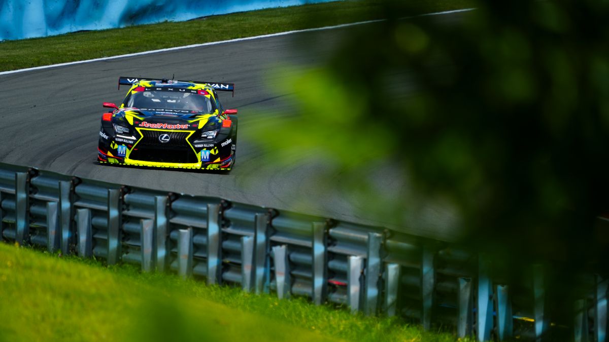 Rear shot of Lexus GT3 car 14 in pit row.