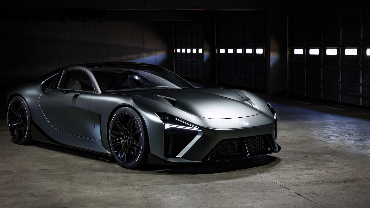 Futuristic Lexus interior concept with a digital cockpit, yoke steering wheel, and minimalist design under cool blue lighting.