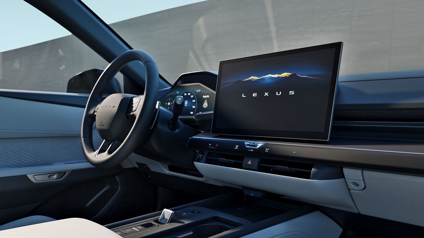 Low-angle shot of front center console and White NuLuxe upholstery with Checkered interior trim.