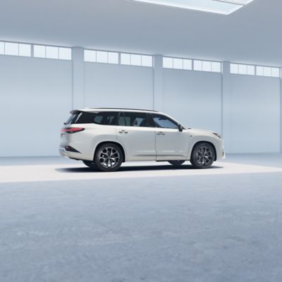 https://tmna.assetscs.toyota.com/is/image/lexusaemcs/lexus/images/models/tx/2026/visualizer/500h-f-sport/exterior/22-in-split-five-spoke-alloy-wheels-with-dark-gray-and-black-finish/wind-chill-pearl/large-11.jpg?extend=-378%2C-507%2C-378%2C-507&hei=600&qlt=100&wid=750